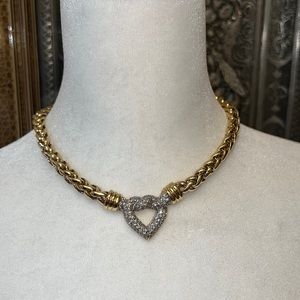 Gold tone metal and crystal heart necklace